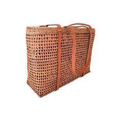 This versatile mesh tote bag is a must-have for any Summer occasion. With its stylish design and convenient size, it's the perfect companion for your resort, beach, or cruise vacation. Its neutral honey color makes it easy to coordinate with any outfit. (PRODUCT INFO): Features drawstring closure Size: 10" height x 14" width x 5" depth inches Fully lined interior with batik print 100% cotton Material: Ata/rattan (SHIPPING INFO): All our items are made-to-order, therefore please allow 3-5 busines Brown Beach Bag With Open Weave And Double Handle, Large Capacity Natural Beach Bag For Travel, Summer Crochet Travel Bag With Top Carry Handle, Brown Open Weave Beach Bag With Double Handle, Rectangular Beach Bag With Top Carry Handle, Natural Beach Bag With Top Carry Handle, Beach Tote Crochet Bag With Top Carry Handle, Bucket Straw Bag With Top Carry Handle For Travel, Travel Beach Bag With Open Weave And Double Handle