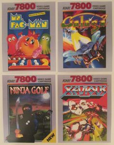 four video game covers from the 80s and 90's, all in very good condition