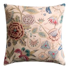 an embroidered pillow with flowers and butterflies on it