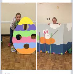 two children playing with cardboard easter eggs in a playroom, and one child standing next to the painted egg