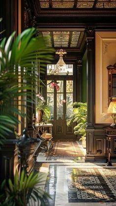 an ornate entry way with potted plants on either side