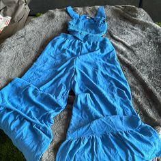 Stretchy Ruched Top With Cut Out Sides And Back With Wide Led Tiered Bottoms. Never Worn Blue Jumpsuit, Ruched Top, Blue Jumpsuits, Turquoise Blue, Pant Jumpsuit, Jumpsuit Romper, Cut Out, Pants For Women, Jumpsuit