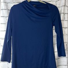 Ladies French Navy Blouse By Lauren Ralph Lauren! Long Sleeve. Asymmetrical Mockneck. Size Medium. Nwt! -Pit To Pit: 18" -Waist: 17" -Length: 25" Machine Wash Cold. Only Non-Chlorine Bleach When Needed; Remove Promptly. Tumble Dry Low. Cool Iron If Needed. 5.24 Blue Asymmetrical Hem Blouse For Fall, Blue Asymmetrical Stretch Top, Blue Stretch Asymmetrical Top, Asymmetrical Blue Blouse For Work, Asymmetrical Blue Blouse For Workwear, Asymmetrical Zip Tops For Spring Workwear, Chic Blue Top With Asymmetrical Neckline, Ralph Lauren Shirt Women, French Navy Blue