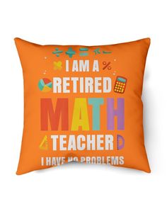 an orange pillow with the words i am a retired math teacher, and a calculator