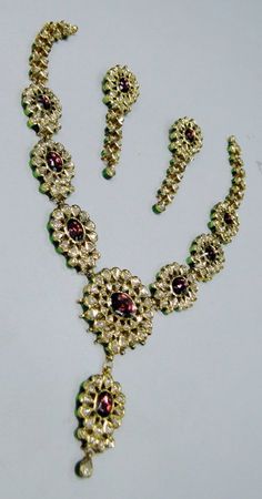 "Vintage 22K solid gold, Old cut Diamonds set with multicolor Enamel work necklace (Kundan Meena choker)with Matching Earrings. A nice old design from the 60s with old cut diamonds. A solid piece of jewelry set with color stones great workmanship. Length of necklace -28 cm (11.02\") Size could be adjusted according to your requirement by adding an adjustable cord. The width of Centerpiece-7 cm (2.75\"), the total weight of set -100.860 Grams (3.55 ounce). Length of earrings-6.5 cm,width of earri 22k Gold Kundan Necklace For Diwali, Yellow Gold Kundan Necklace For Festivals, Yellow Gold Kundan Necklace With Meenakari For Puja, Festival Yellow Gold Kundan Necklace, 22k Gold Kundan Necklace With Meenakari, 22k Gold Meenakari Bridal Necklace, Yellow Gold Kundan Necklace For Diwali, 22k Gold Bridal Necklace With Meenakari, Ceremonial Yellow Gold Kundan Necklace With Meenakari