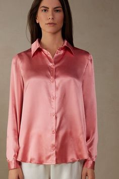 Long sleeve shirt in pure silk with collar and buttons up the middle. Back box pleat for a draped, loose fit. Buttoned cuffs and rounded hem.
The model is 5’ 9” (175 cm) tall and is wearing a size S.

The silk in this piece is bluesign® certified. Luxury Silk Button-up Tops, Elegant Long Sleeve Shirt For Daywear, Elegant Silk Shirt For Daywear, Classic Silk Tops, Chic Semi-formal Silk Shirt, Chic Silk Shirt For Semi-formal Occasions, Semi-formal Silk Top With Fold-down Collar, Semi-formal Silk Top With Fold Down Collar, Elegant Silk Top With Spread Collar