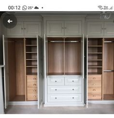 an image of a closet with drawers and cabinets in the same color as shown above