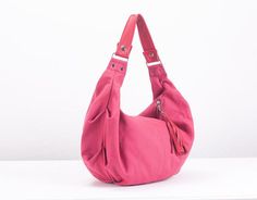 This is the mini version of the Kallia bag.For those who aren't used in carrying large purses,this is the ideal size.Still roomy enough to carry your daily essentials inside but in a smaller size.This slouch bag was made using a pink cotton canvas and genuine leather for the handle and zipper pulls.All the leather parts can be removed from the bag so it is easier to clean it ,in case it gets dirty.Not to mention that you can order extra handles and zipper pulls and interchange the colors dependi Pink Hobo Tote Bag For Daily Use, Pink Hobo Bag For Daily Use, Pink Tote Hobo Bag For Daily Use, Everyday Pink Pouch Canvas Bag, Pink Casual Hobo Bag, Everyday Pink Canvas Pouch Bag, Pink Everyday Canvas Pouch Bag, Versatile Pink Hobo Bag, Pink Everyday Hobo Bag Shaped As Satchel