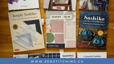 several books on sewing and quilting are displayed in front of a wooden background with the title, simply sashiko