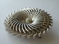 "Excellent vintage condition. Diameter approximately 2\". Trifari silver plated metal pinwheel brooch/pin. Layered. Platinum Blondes Trifari Blondes advertising 1965 Harper Bazaar. ( Last photo )" Harper Bazaar, Irish Harp, Everything Is Fine, Butterfly Brooch, Platinum Blonde, Harpers Bazaar, Rhinestone Necklace, Clear Rhinestones, Antique Jewelry