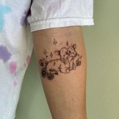 a person with a small tattoo on their arm and the image of an elephant is shown