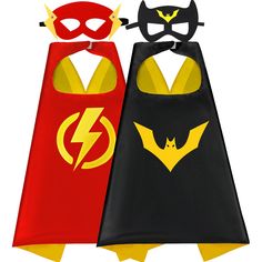 two children's capes in the shape of batman and catwoman, one is red