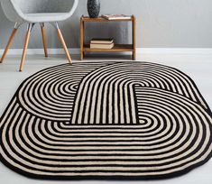 a black and white area rug on the floor