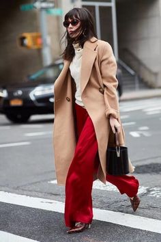 40+ Trendy Wide Leg Pants Outfit Ideas To Kick Your Style Up A Notch Red Trouser Pants Outfit, Red Trousers Outfit Winter, Satin Red Pants Outfit, Red Wide Pants Outfit, Red Pants Winter Outfit, Red Satin Pants Outfit, Wide Leg Red Pants Outfit, Red Pants Christmas Outfit, Red Culottes Outfit