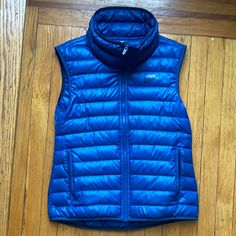 Nike Blue Vest Unisex Size Small. Never Worn. Nwot. No Rips Or Damages. Got It As A Gift But It Doesn’t Fit Nike Blue Outerwear For Fall, Blue Nike Outerwear For Fall, Sporty Blue Sports Vest, Sporty Blue Workout Vest, Blue Sporty Outdoor Vest, Nike Vest, Loose Vest, Nike Zip Up, Blue Vest