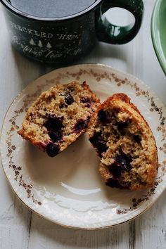 a muffin cut in half on a plate