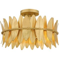 a chandelier made out of wood with leaves on the top and bottom part