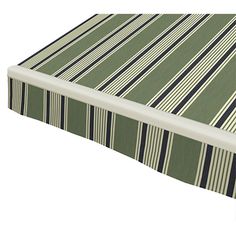 an image of a bed with green and white striped bedspread on it's side