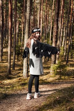 "A crow costume consists of a dress or vest with wings made from soft fleece and a headband. Can be useful in carnivals, children and adult activities, and parties! AgeHeight (inHeight (cm) 23692 33998 441104 543110 646116 748122 850128 953134 1055140 1157146 1260152 1362158 1465164 You can order only wings or headband because all my items are made specifically for each customer, and every order. If you are looking for another costume, message me, tell me about your needs and I will turn your id Raven Costume Halloween, Kids Bird Costume, Bird Costume Kids, Jungle Book Costumes, Sophie Blackall, Raven Costume, Adult Activities, Inspired Costumes, Crow Costume