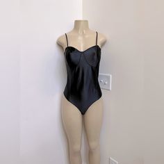 H&M Silky Black Bodysuit Sz Medium. Chic Black Underwire Bodysuit, Fitted One-piece Bodysuit For Date Night, Chic Underwire Bodysuit For Party, Black Underwire Bodysuit For Party, Underwire Lined Bodysuit For A Night Out, Fitted Underwire Bodysuit For Party, Sleek Fitted Bodysuit With Underwire, Fitted H&m Bodysuit For Summer, Black Lined Bodysuit For Date Night