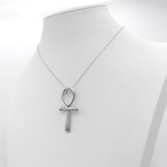 Both the necklace chain and large Egyptian ankh pendant are made from pure .925 sterling silver with stamp.  No coatings, no plating, just sterling silver! Embrace the mysticism and beauty of the Egyptian ankh cross with this stunning sterling silver necklace. Crafted from solid .925 sterling silver, this large pendant measures approximately 1 7/8 inch (48 mm) tall, making it a bold and eye-catching statement piece. Unveil the mysteries of ancient Egypt with this exquisite .925 Sterling Silver Egyptian Ankh Pendant Necklace. Crafted from the finest sterling silver, this timeless piece features the iconic ankh symbol, a potent talisman of eternal life and protection. Its hidden bails lend a touch of elegance, while the choice of necklace chains allows you to personalize your look. Whether y Ankh Necklace Silver, Silver Ankh Cross Spiritual Necklace, Nickel-free Ankh Necklace As Gift, Silver Ankh Amulet Necklace, Silver Ankh Gothic Necklace, Ankh Symbol, Ankh Necklace, Protection Symbols, Snake Chain