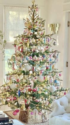 a decorated christmas tree in a living room