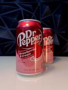 two cans of dr pepper strawberry cream soda