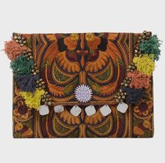 This Colorful Clutch is the ultimate boho-chic accessory. This gorgeous bohemian clutch bag is the perfect accessory to give a unique look to your casual outfits or night out events. Can be also used as an amazing iPad case. Handcrafted by talented artisans using a stunning fabric embroidered by the Hmong hill tribes in Northern Thailand. Details: Material: Embroidered cotton fabric with discreet birds design. Tassel and coins decoration. Magnetic closure with interior zipper pocket Cotton linni Bohemian Clutch, Embroidered Clutch Bag, Boho Chic Accessories, Embroidered Clutch, Red Purple, Bird Design, Bohemian Style, Pink And Orange, Tassels