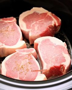 four raw meats are in the slow cooker and ready to be put into the crock pot