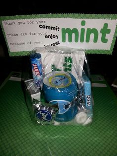 an assortment of toothpaste and mouthwashes in a plastic bag on a table