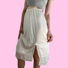 Vintage 80s Vassarette White Lace Midi Lingerie Lace Slip Skirt Pullover closure with a stretchy waist - has a semi sheer material Brand - Adonna Tag size - Large, fits like a small/medium imo Seen on size xsmall waist. 5'4 with waist pinned  Measurements (laying flat) Waist (no pull) 11.25 in - (taut) 20.5 in Length - 25 in #slipskirt #fairyskirt #80sfairyskirt #lingerieskirt #whitelaceskirt Lace Slip Skirt, White Lace Skirt, Fairy Skirt, Amarillo Tx, Lace Slip Dress, Slip Skirt, Lace Slip, Sheer Material, Lace Midi