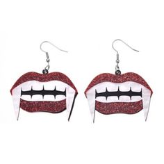 pair of red glittered lips with teeth hanging from the front and back of them