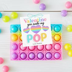 a card that says valentine you make my pop on it next to some eggs and candies