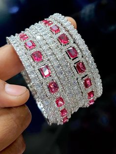 Indian Silver Tone American diamond Ruby Red Zircon Bangles Bracelet Set Bollywood Ethnic Wedding Costume Jewelry, Gift Bangle Set Buy with confidence, Enjoy your Free Gift With every purchase. Thank you!! SHIPPING POLICY We ship worldwide. Handling time is 2 to 3 working days after receiving final payment exclude weekends and public holidays. Delivery time will be 10-22 working days. Kindly provide complete and updated address for smooth shipping Import duties, taxes and charges are not include Ruby Bangles, Red Bangles, Diamond Red, Ethnic Wedding, Wedding Costume, Bangles Indian, Bangle Bracelet Set, Wedding Costumes