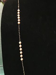 "This piece was designed to copy an actual necklace worn by Lady Mary in the PBS series Downton Abbey. This necklace is 50\" of glittering faceted gold natural iron pyrite beads interspersed with mint condition 6mm vintage cream faux Majorca pearls OR genuine AAA freshwater pearls (choose when you checkout). This is a VERY long necklace; it measures 50\" total from top to bottom. It can be worn as one long necklace (if you're tall or channeling your inner flapper) but it's also meant to be loope Classic Evening Necklace With 17 Jewels, Elegant Beaded Double Strand Necklace, Elegant Beaded Chain Necklaces For Jewelry Making, Elegant Handmade Chain Necklace With Round Beads, Classic Evening Pendant Necklace, Antique Long Necklace For Formal Occasions, Classic Long Evening Necklace, Elegant Formal Handmade Beaded Necklaces, Formal Art Deco Round Necklace