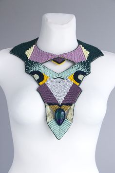 One of a kind multicolor statement necklace. Large collar necklace made only of seed bead and natural multicolor gemstone. The shape and colors of the stone can be slightly different. This is big and bold bead embroidery necklace design, but it is not very heavy at all. Necklace neck size is adjustable for each neck size. The back side of necklace is animal friendly Italian fabric, gentle to your skin. Statement necklace made mostly of mate seed beads color. Colorful and large body necklace desi Unique Multicolor Faceted Beads, Multicolor Beaded Crystal Necklaces For Jewelry Making, Unique Colorful Beaded Necklaces, Multicolor Bib Necklaces With Polished Round Beads, Colorful Unique Beaded Necklaces, Unique Multicolor Bib Necklaces With Colorful Beads, Unique Multicolor Necklaces With Faceted Beads, Unique Multicolor Bib Necklace With Colorful Beads, Unique Colorful Beaded Necklace