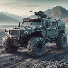 an armored vehicle driving through the desert with mountains in the backgrouds behind it