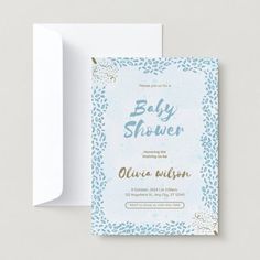 a blue and white baby shower card with an envelope