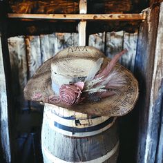 Burned straw cowboy hat with rose and feather embellishments. Detavhable hat fascinator feather hat piece with rose and and feathers. saying is "She Blooms Where She's Planted" Dried Flowers Hat Band, Country Style Top Hat For Kentucky Derby, Western Hat Bands For Wedding And Kentucky Derby, Rustic Straw Hat For Rodeo At Kentucky Derby, Feather Trim Hat For Rodeo And Kentucky Derby, Feather Trimmed Hat For Rodeo And Kentucky Derby, Bohemian Straw Hat For Kentucky Derby Country Events, Western Mini Hat With Feathers For Rodeo, Western Mini Hat With Feathers For Country Events