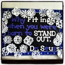 a bulletin board with snowflakes on it and the words, why fit in when you were born to stand out?