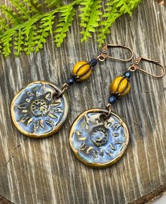 Sunflower Sky Ceramic Earrings Artisan Jewelry Long Dangle Made in the USA Fast n Free Shipping  🌿These tiny works of art will adorn your earlobes with tiny  artisan ceramic 🌻 🌻, blue sky, Czech glass & copper caps, and copper lever back ear wires Free one week day Shipping!🌿 Satisfaction guaranteed or your money back. Artisan Drop Earrings With Artistic Design, Adjustable Drop Earrings With Artistic Design, Artisan Dangle Earrings With Artistic Design, Artisan Earrings With Artistic Design, Artisan Round Earrings With Artistic Design, Artsy Copper Drop Earrings, Artistic Dangle Jewelry As Gift, Artistic Dangle Jewelry For Gifts, Artistic Design Dangle Jewelry Gift