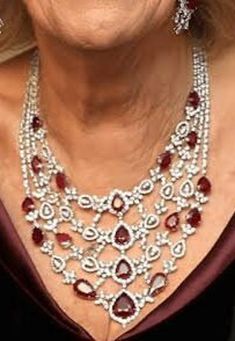 Victorian 925 silver queen Camellia multi strand ruby necklace royal statement necklace for her wedding, bridal necklace, gift for motherMetal Purity:925 Metal weight: 180.100 gram Stone :CZ Zircon   Ctw: 120.900 ctw Gemstone:Ruby Gemstone weight: 49 ctw Necklace finished colour: white gold plated 5 star service available  *Handmade item# *Free shipping worldwide# *Free engraving# *For other queries contact us any time # *Metal available: Sterling Silver Rose gold, yellow gold, white gold # *Ser Ruby Necklace, Ruby Gemstone, Bridal Necklace, Silver Rose Gold, Silver Roses, Multi Strand, Mother Gifts, Ruby, 925 Silver