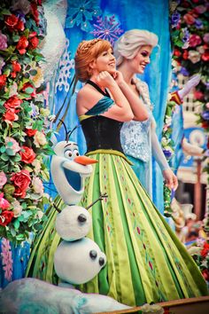 the frozen princess and her friend are standing in front of an image of snow queen