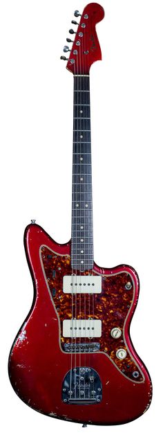 a red electric guitar sitting on top of a white background