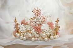 "Pink Clover and enamelled ferns, Austrian Crystals and faux pearls, and tiny rose-quartz coloured beads are intertwined in The PARFAIT Tiara.  Not just for Brides, this glittering, magical, tiara is perfect for flower girls or fairies. MEASUREMENTS High Point: 3.5 inches.  Length: 15\".  Embellished Length: 8\".  Diameter: 5.5\" flexible. Weight: 3.1 oz. High Point: 9 cm, Length: 38 cm. Embellished Length: 20cm.   Diameter: 14 cm flexible. Weight: 89 grams  UNBOXING Your beautiful hair adornment will arrive in a velvet jewelry pouch, specially designed for our Crowned by Juliet tiaras and headpieces.  Prepare for princess packaging! STYLE: Crowned by Juliet welcomes your style questions.  Send us a photo of your gown,  and some information about your venue and wedding theme, and we will h Princess Packaging, Cosplay Halo, Pink Tiara, Halo Cosplay, Boho Bridal Headpiece, Pink Clover, Rose Quartz Color, Boho Headpiece, Fairy Crown