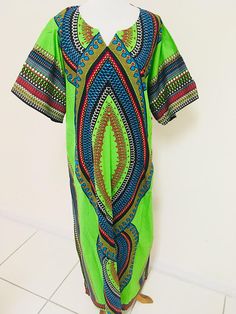 Dashiki Long Dress with pocket at each side African Print one Traditional Multicolor V-neck Maxi Dress, Multicolor Long Maxi Dress For Festival, Green Dress With Colorful Pattern For The Beach, Bohemian V-neck Maxi Dress With Colorful Pattern, Multicolor Cotton V-neck Maxi Dress, Casual Long Green Maxi Dress, Colorful Green Beach Dress, Green Bohemian Kaftan With Vibrant Print, Hippie Multicolor Long Maxi Dress