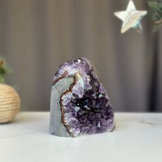 This is a unique Amethyst with unusual druzy cave formations on one side. The stone you will receive is the exact one as in the picture. ✧ MEASURES: Width: 3.5 in x Height: 4 in. Weight 1.8 lb (841 gr) Amethyst Geodes Gemstone Gift, Purple Natural Stones Geodes As A Gift, Purple Natural Stone Geodes For Gifts, Purple Geodes With Natural Stones As A Gift, Purple Geodes Natural Stones As Gift, Large Amethyst Geodes As Gifts, Large Amethyst Geode Stone As A Gift, Large Amethyst Geode As Gift, Handmade Amethyst Geodes Gift