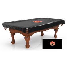 a pool table covered in black cloth with alligator logo on the top and bottom edge