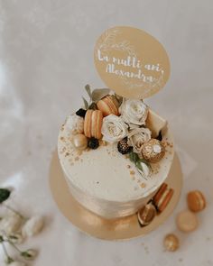 there is a cake with flowers and nuts on it