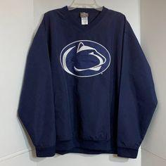 Nwot Penn State Men’s Pullover In Size Large. Material Is 100% Polyester. Large Pockets In Front. Measurements Chest-26.5” Length-29 Sleeve-23” College Winter Windbreaker With Crew Neck, Blue Long Sleeve Windbreaker For College, Blue Long Sleeve Sweatshirt For Fans, College Winter Crew Neck Windbreaker, Blue Long Sleeve Sweatshirt For Fan Gear, Penn State Sweater, Penn State Tailgate, Penn State Basketball, Vintage Penn State Sweatshirt